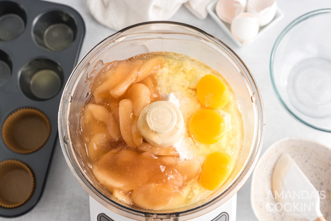 eggs, cake mix, and apple pie filling in a food processor