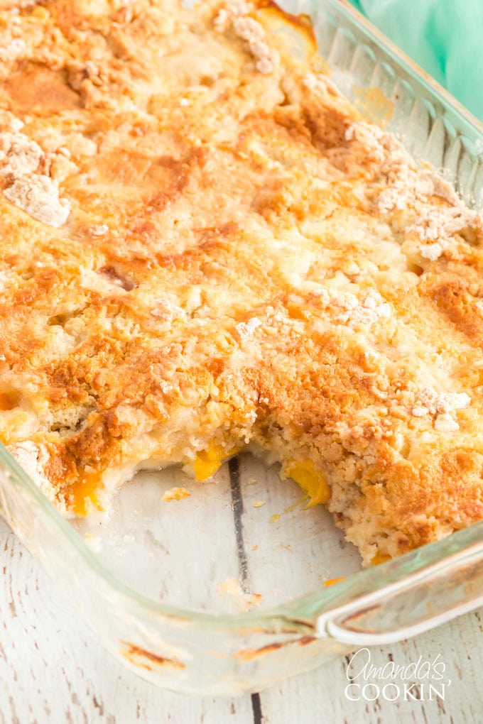 pach dump cake with a slice out of it