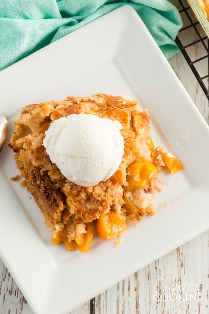 overhead view of peach dump cake with ice cream