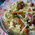 A close up photo of a bowl of Asian broccoli salad.