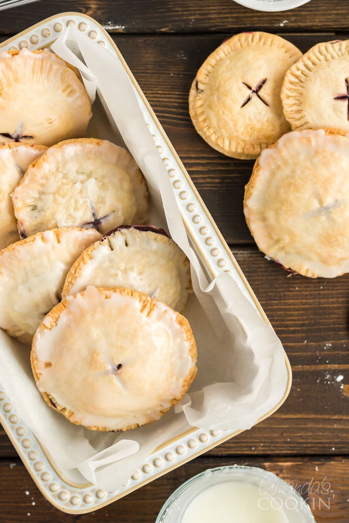 dish full of blueberry hand pies