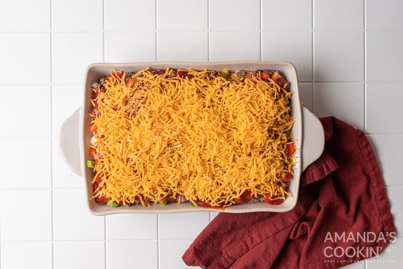 shredded cheese on top of casserole