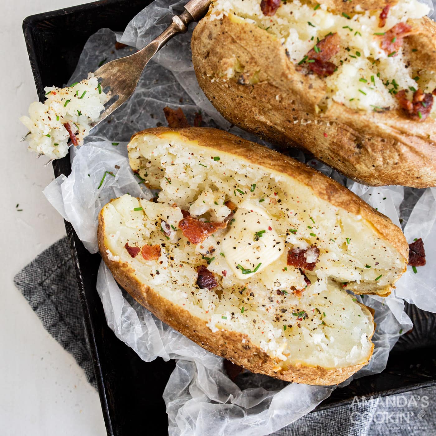 air fryer baked potatoes on a plate