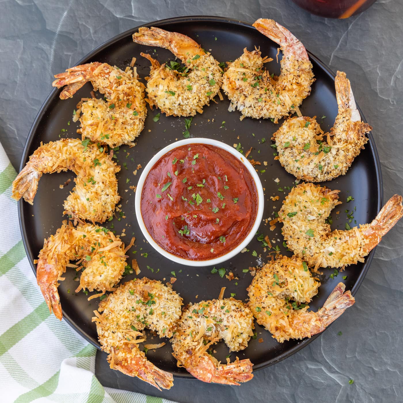 Air Fryer Coconut Shrimp on black plate