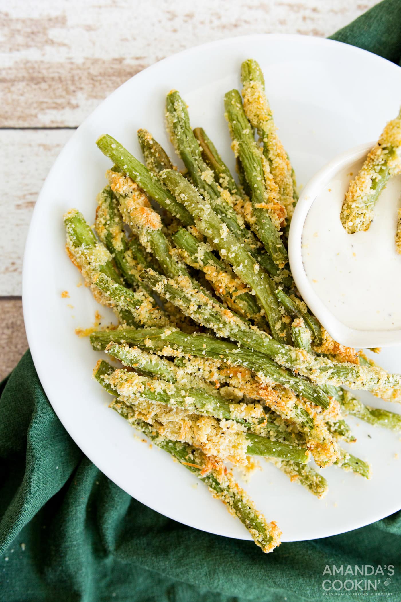 Air Fryer Green Bean Fries on a plate with dip