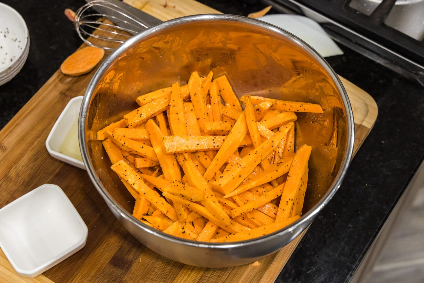 sweet potato fries tossed in oil and seasonings