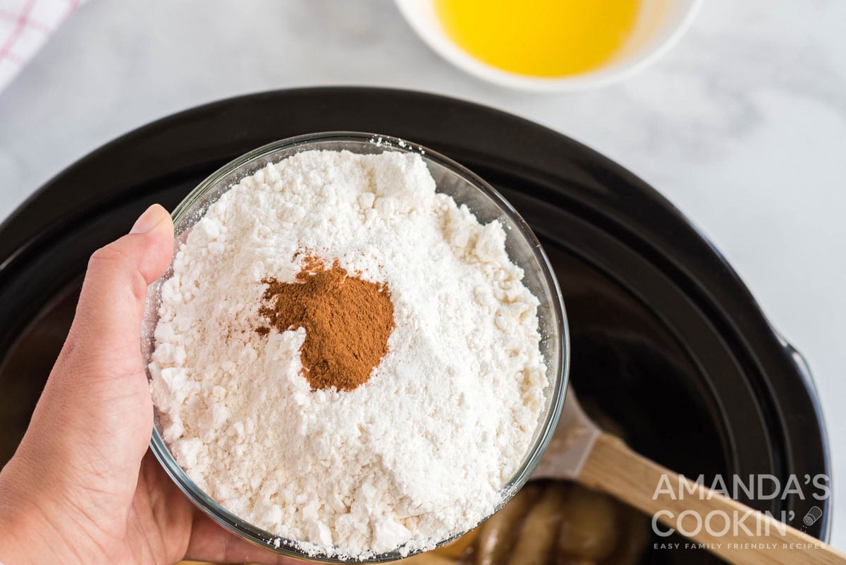 cinnamon in a bowl of dry cake mix