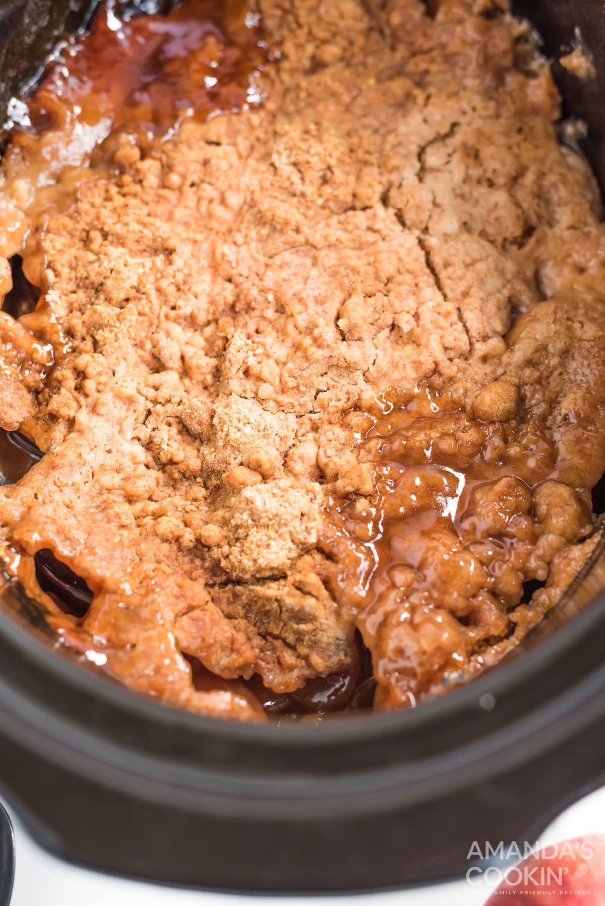 apple dump cake that has been cooked in a crockpot