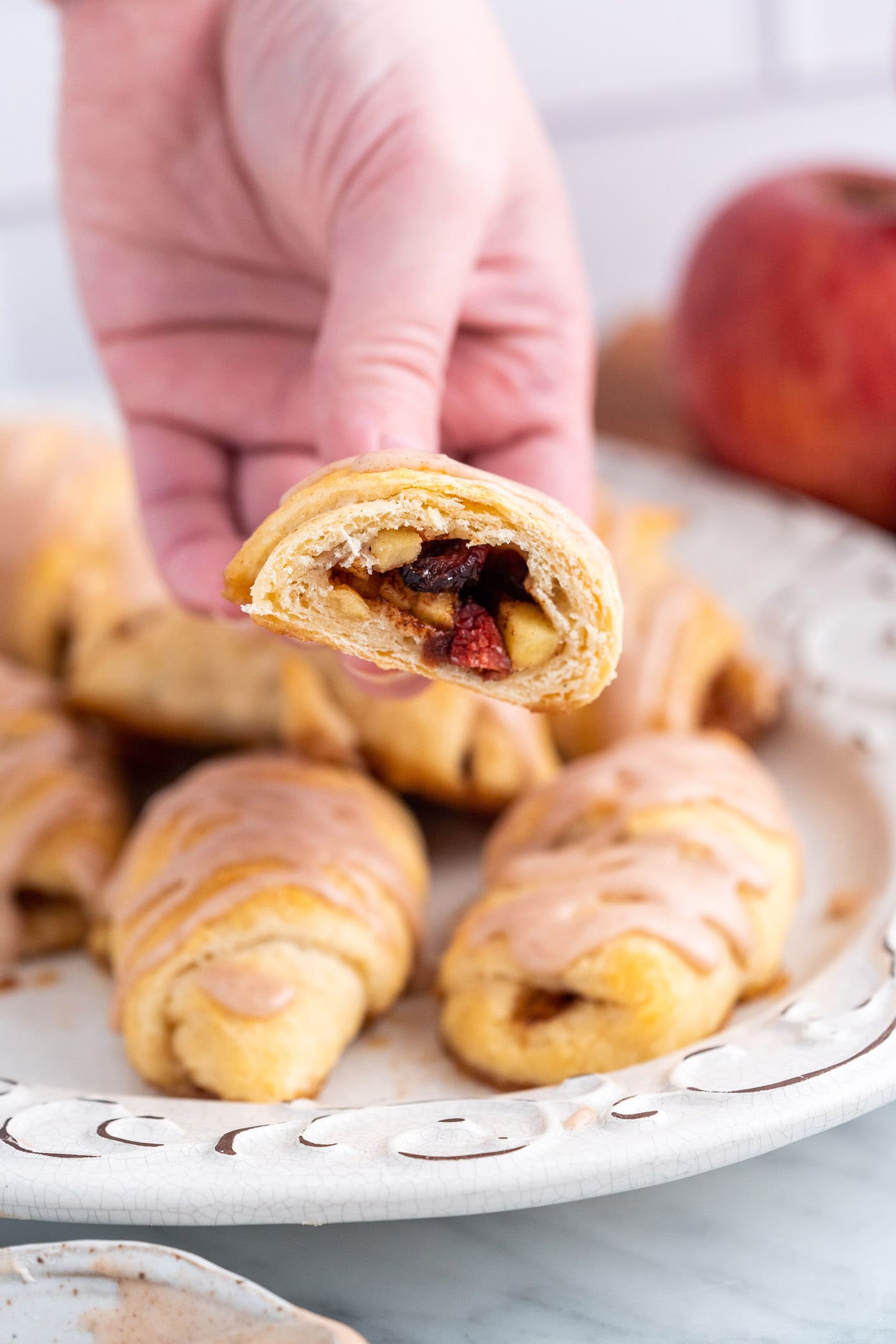 hand holding an Apple Pie Bite