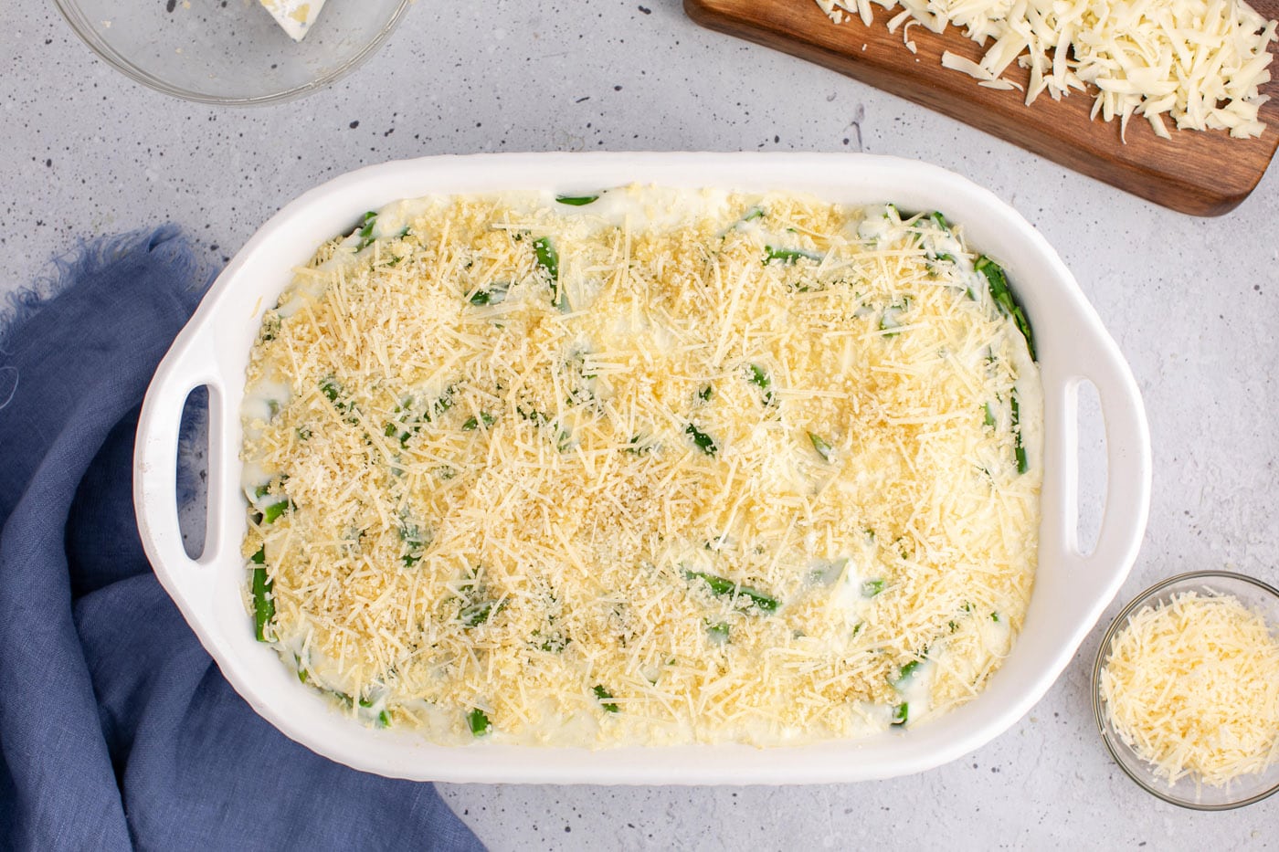 parmesan cheese and panko on top of asparagus casserole