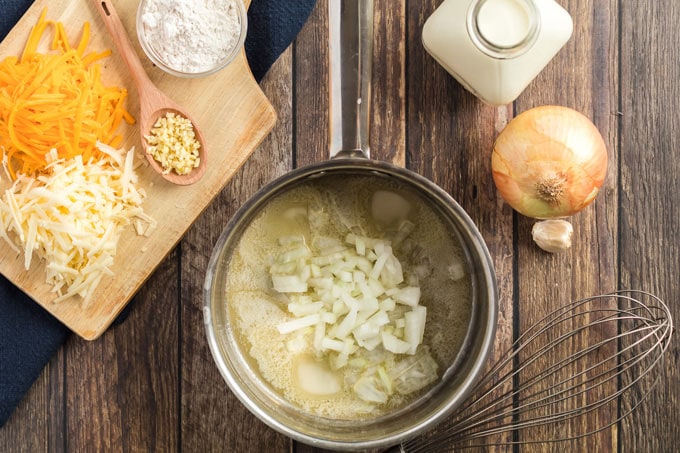 saucepan with melted butter and onion