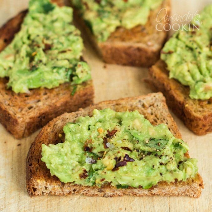 slices of avocado toast on a cutting board