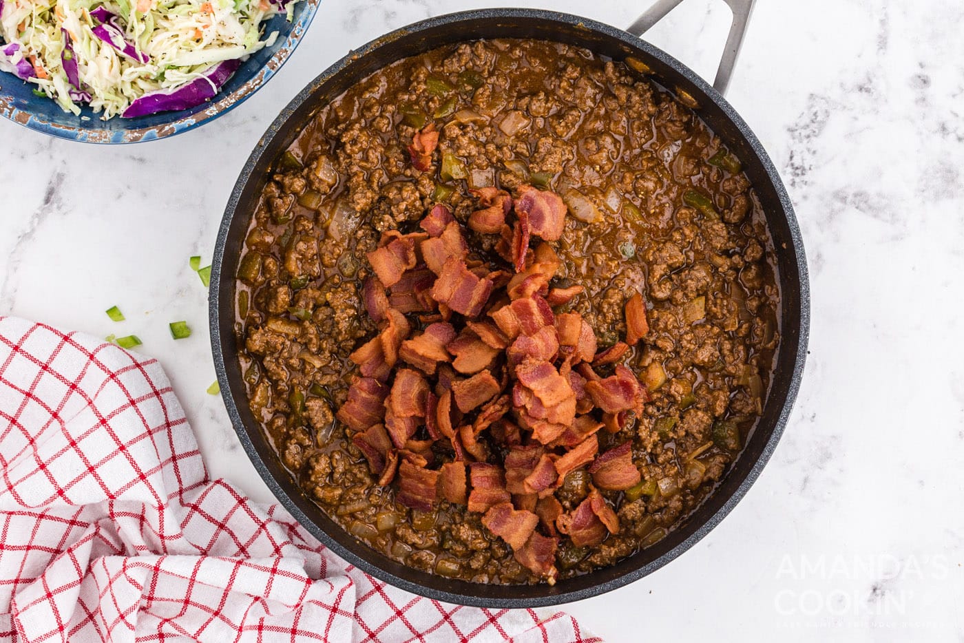 bacon in pan with ground beef