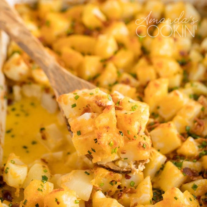 cheese potatoes on a wooden spoon