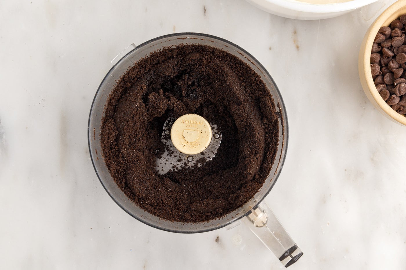 blended Oreo cookies in a food processor