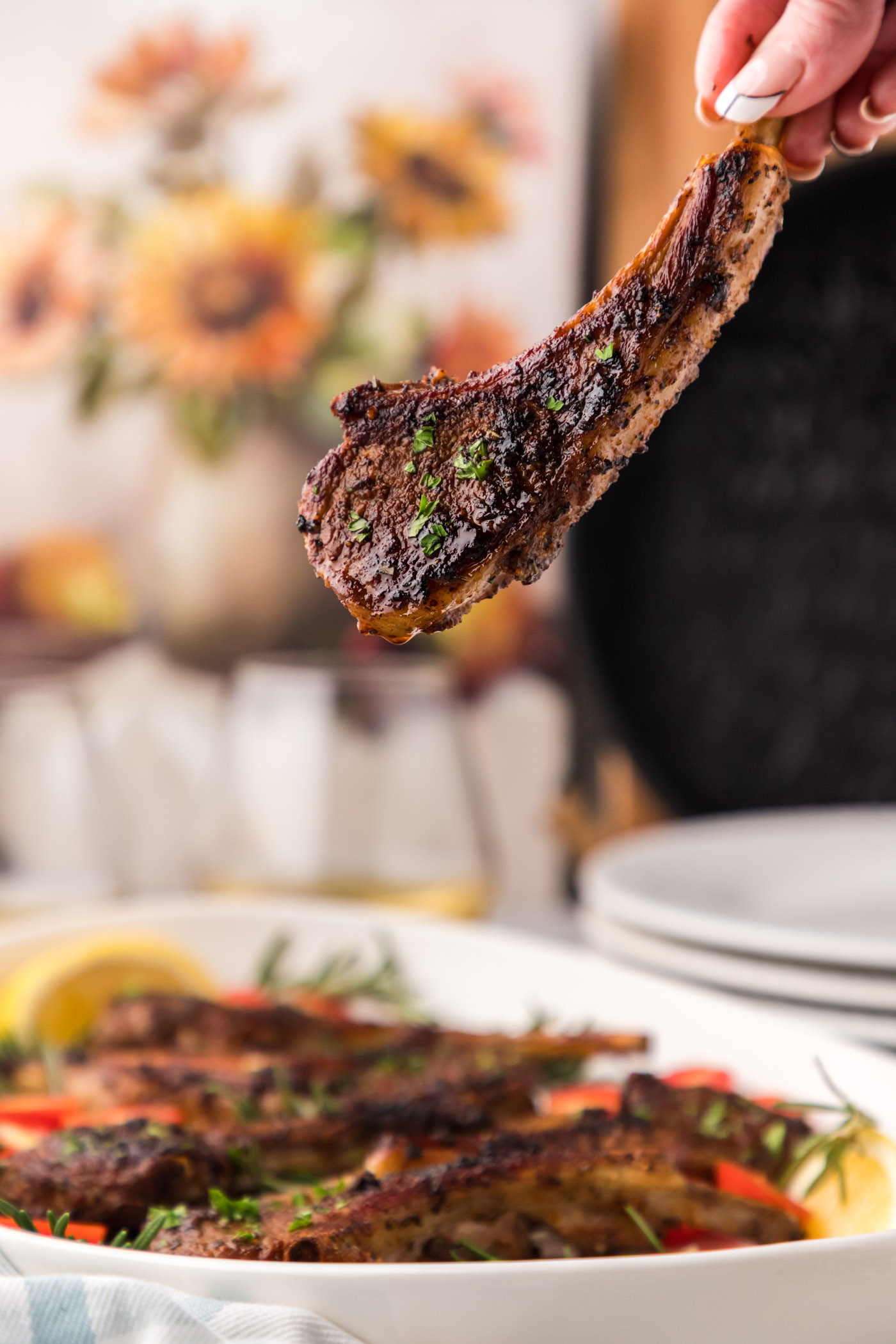 holding a Baked Lamb Chop