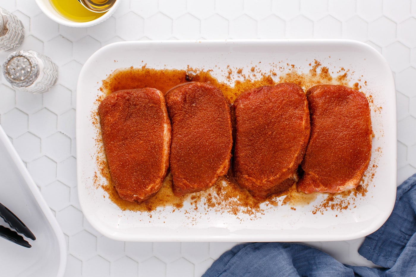 seasoned pork chops on a serving platter