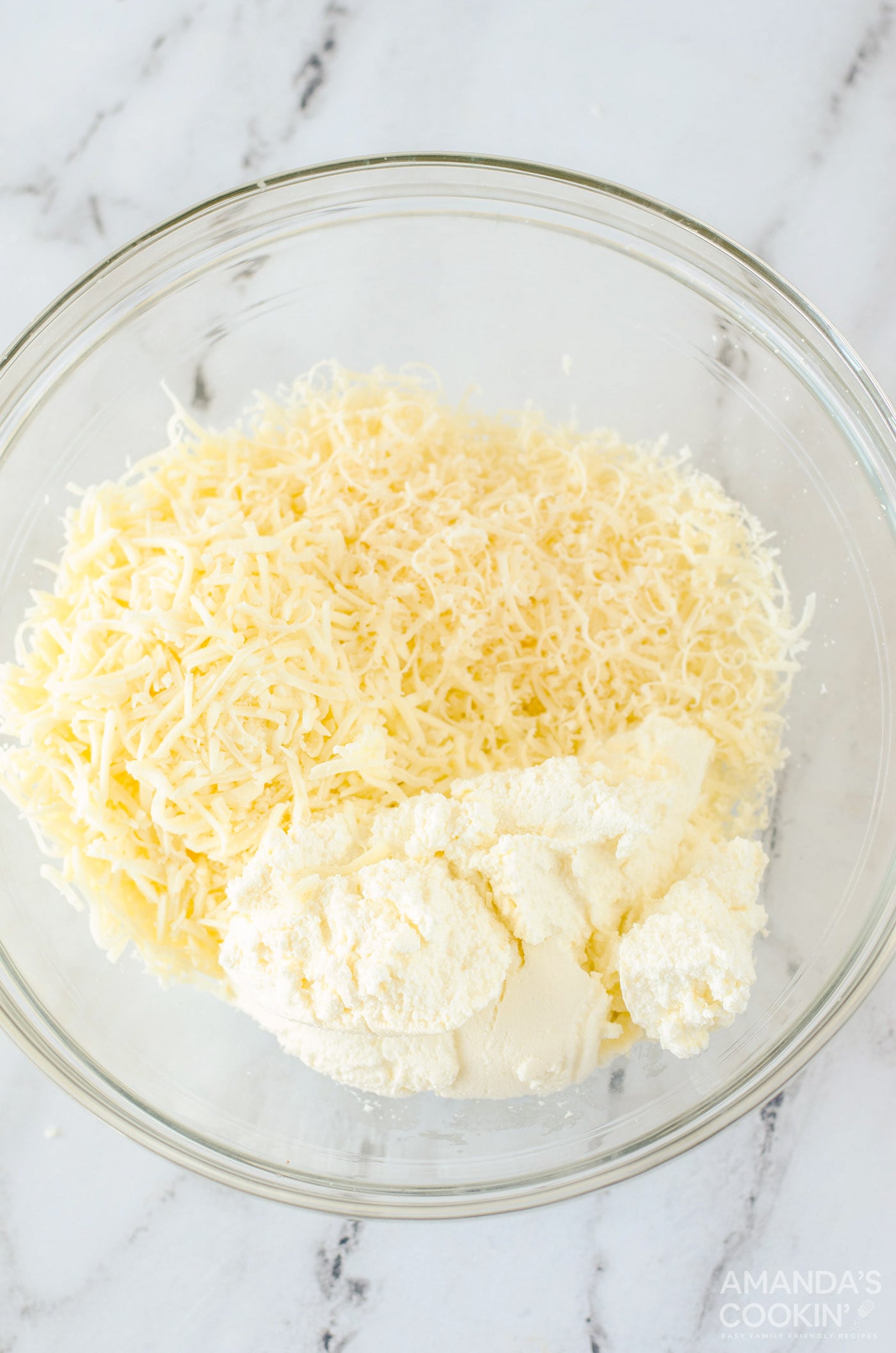 three cheeses in a bowl