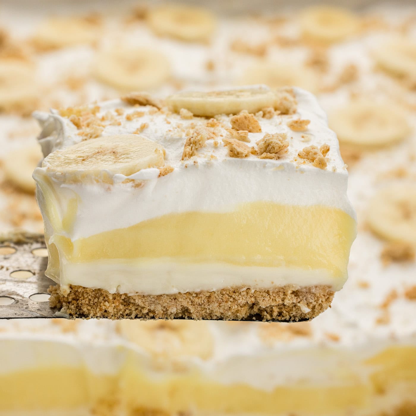 spatula lifting a slice of Banana Cream Lush
