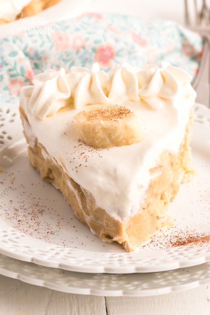 slice of banana cream pie on a white plate