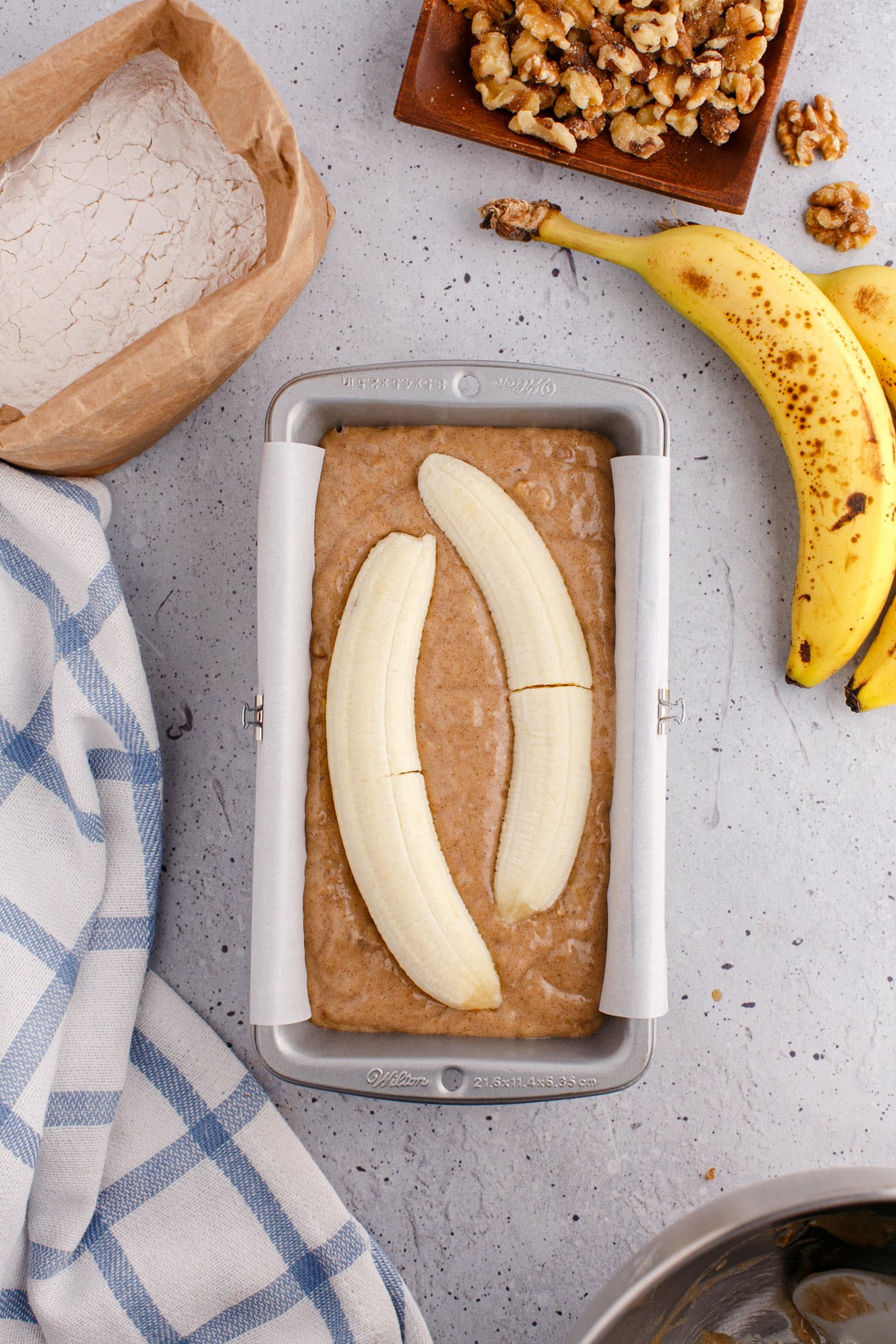 banana slice on top of banana bread batter