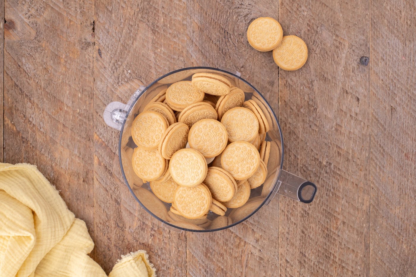 golden oreos in a food processor bowl