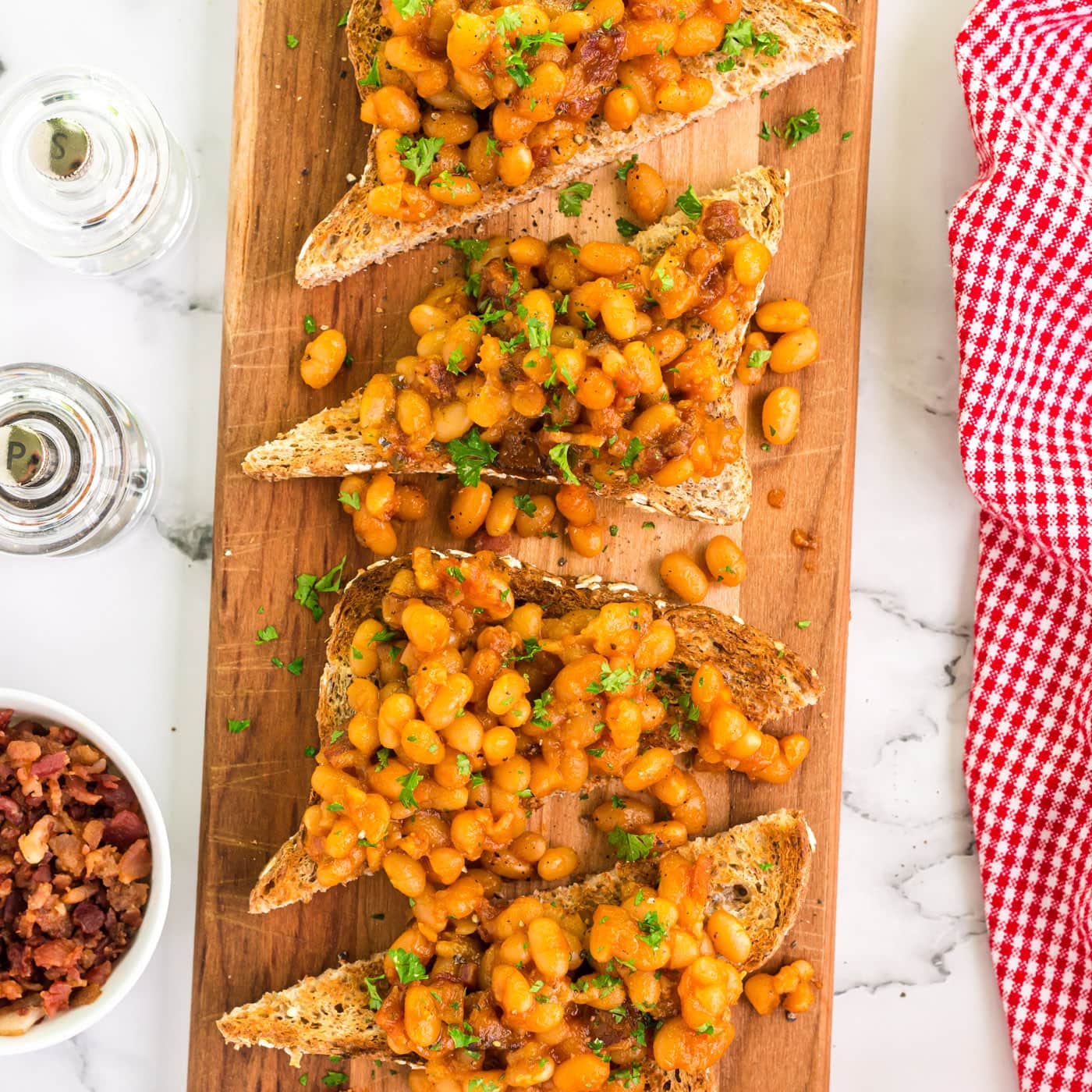 Beans on Toast on a wooden platter