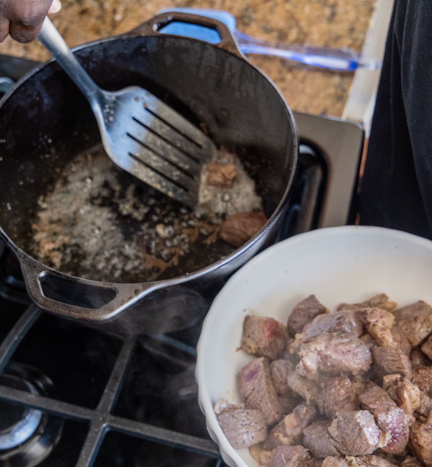 removing browned beef from dutch oven