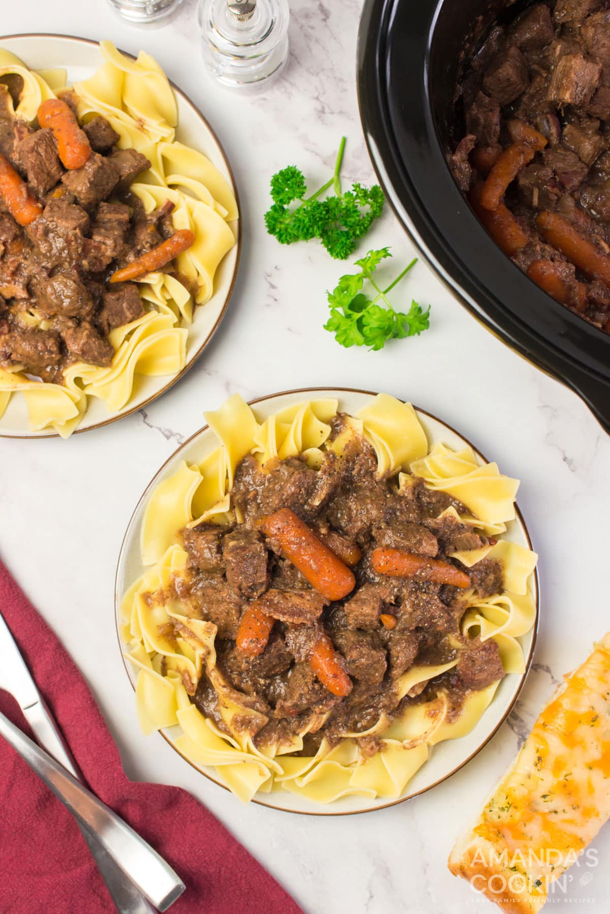 two plates of beef burgundy