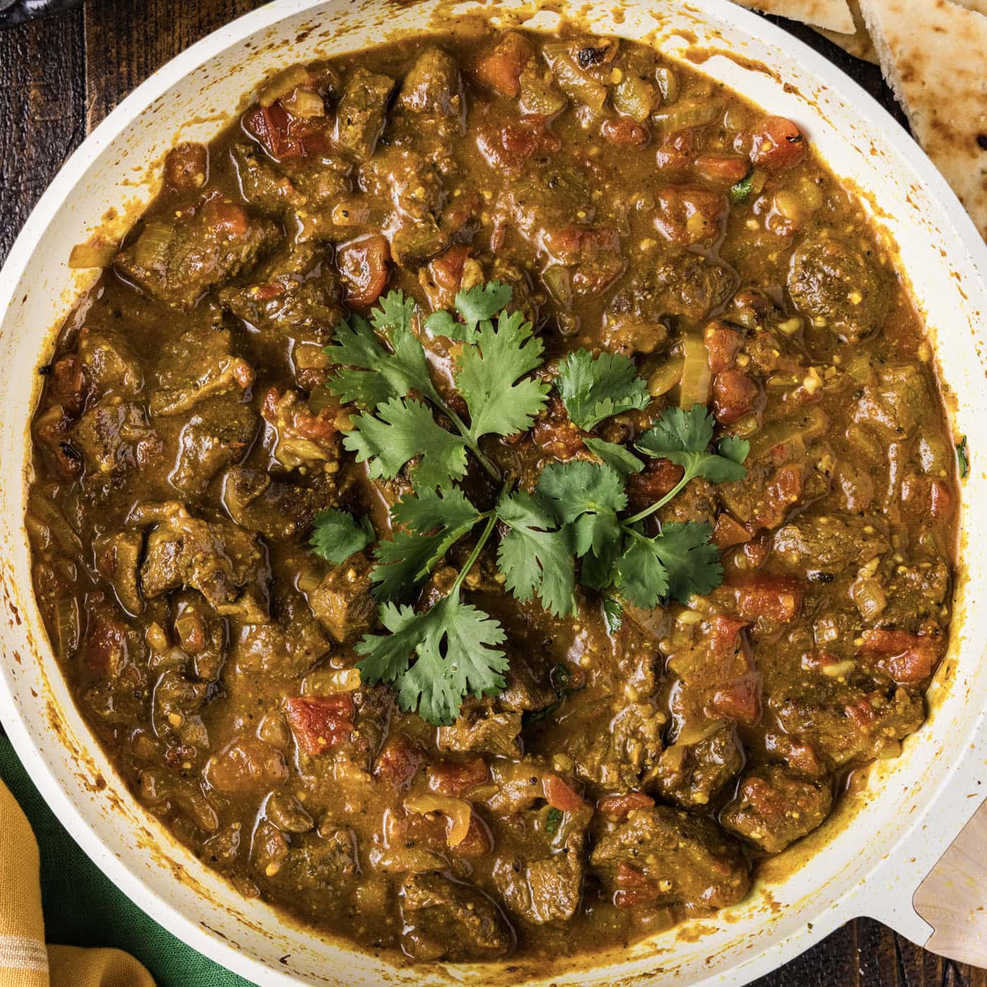 Close up photo of a skillet of Beef Curry