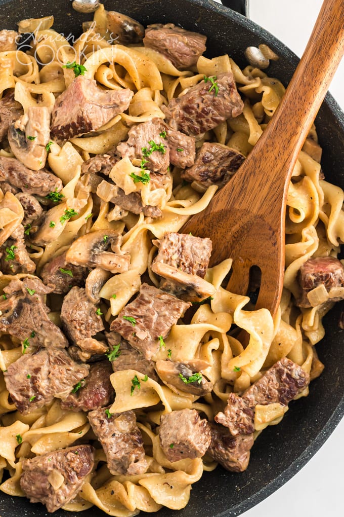 pan of beef stroganoff with wooden spoon