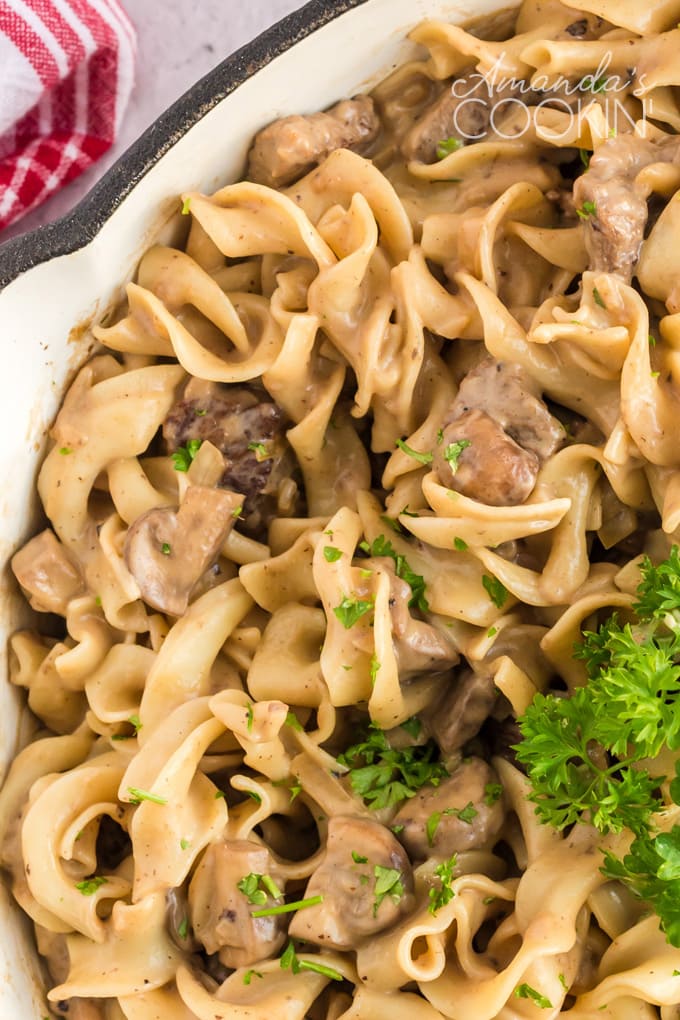 beef and noodles in white pan