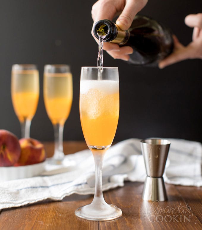 pouring Prosecco into champagne flute