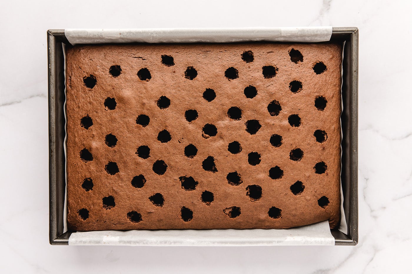 poked holes in chocolate cake