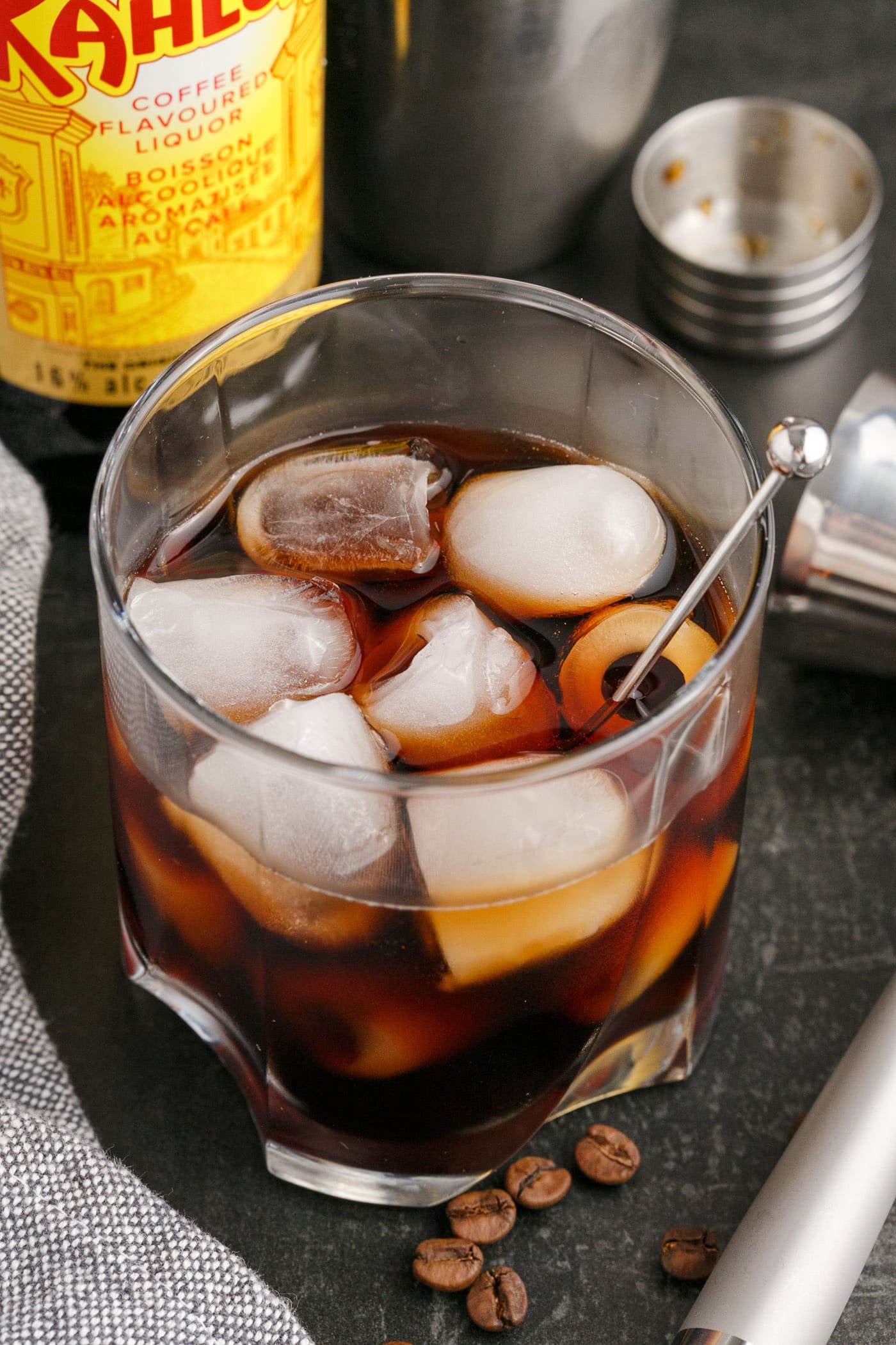Black Russian with a Kahlua bottle in the background