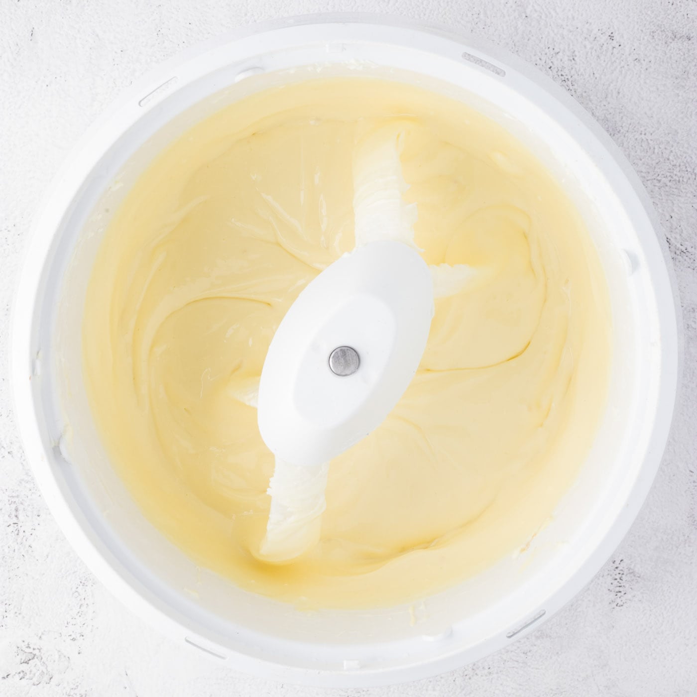 cheesecake batter in a mixer bowl
