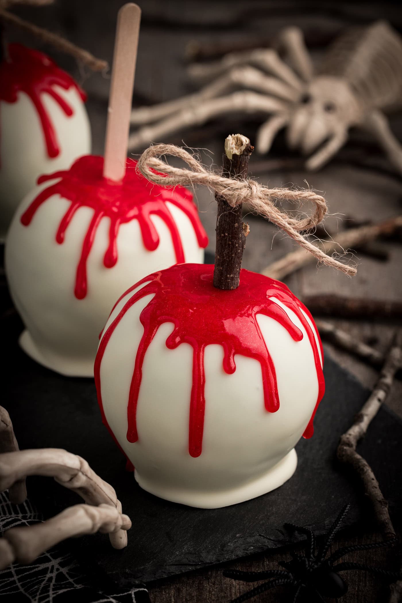 Three Bloody Candy Apples lined up in a row