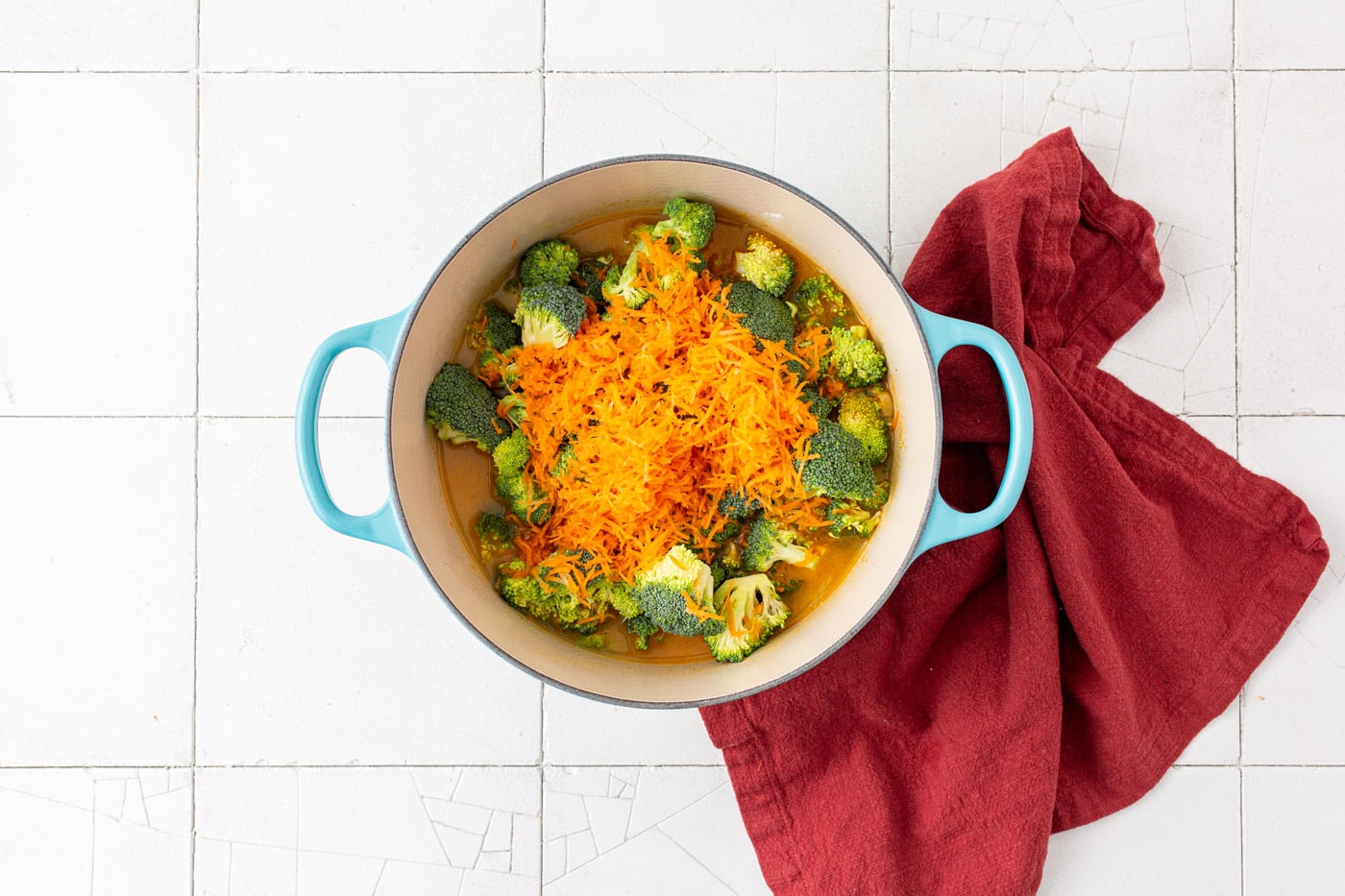 carrots and broccoli florets in a dutch oven