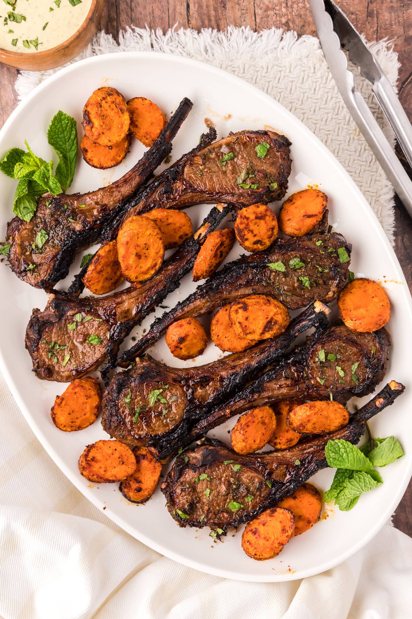 Platter of Broiled Lamb Chops with carrots