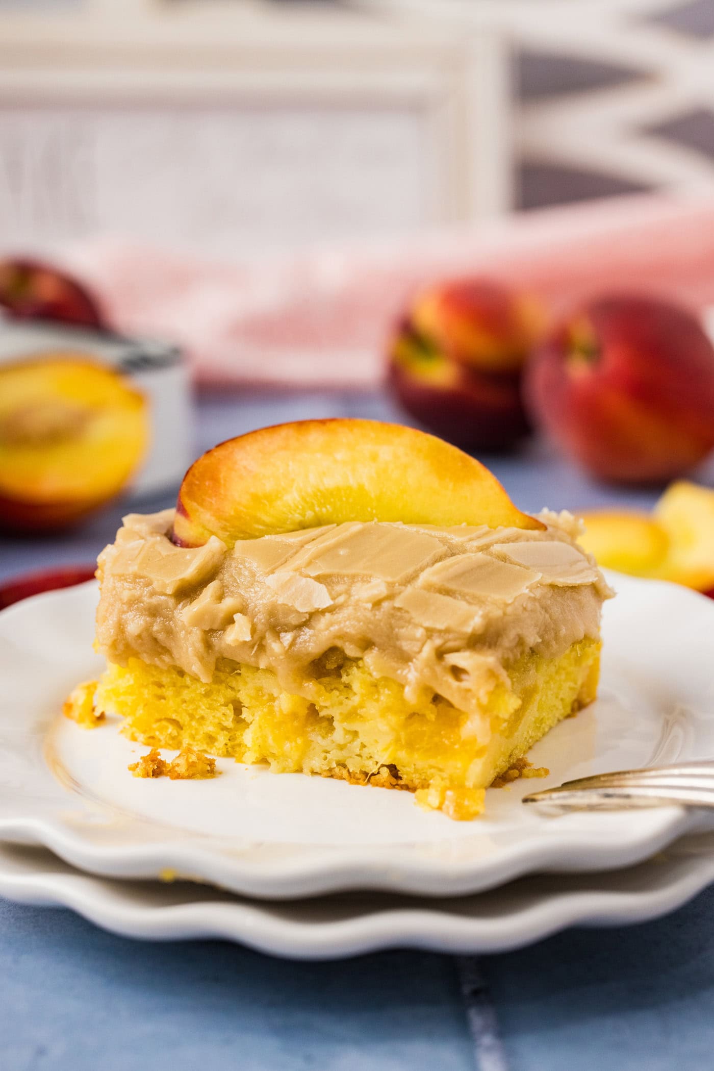 Slice of Brown Sugar Peach Cake on a plate