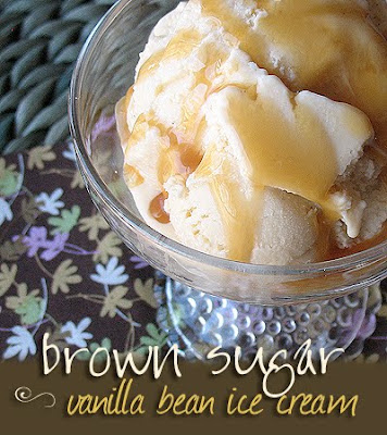 A close up picture of brown sugar vanilla bean ice cream in a clear bowl with caramel drizzle on top.