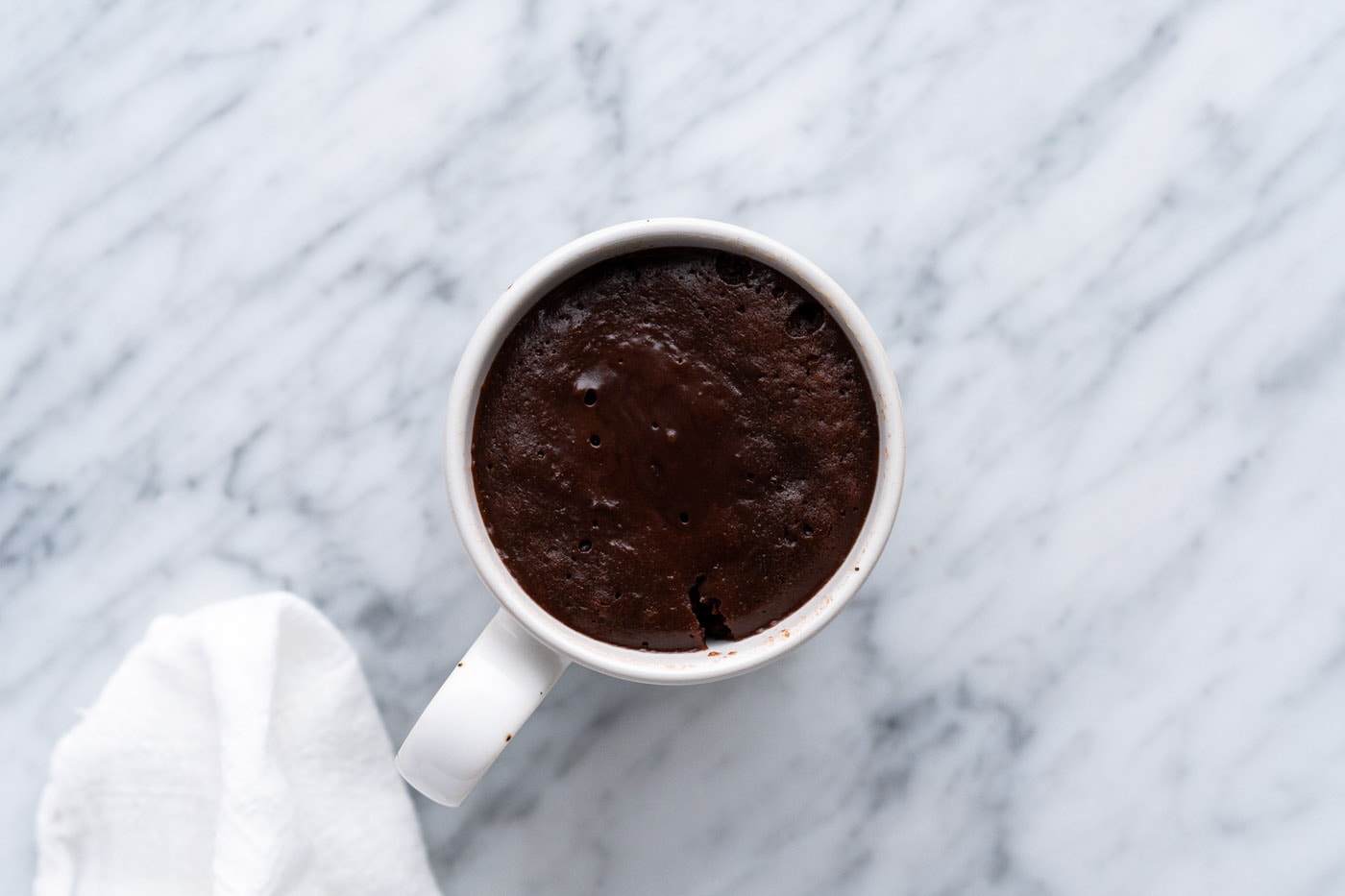 cooked brownie in a coffee cup