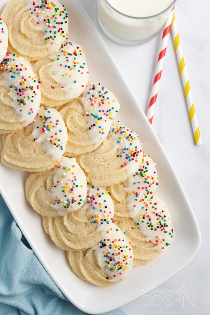 plate full of chocolate dipped butter cookies