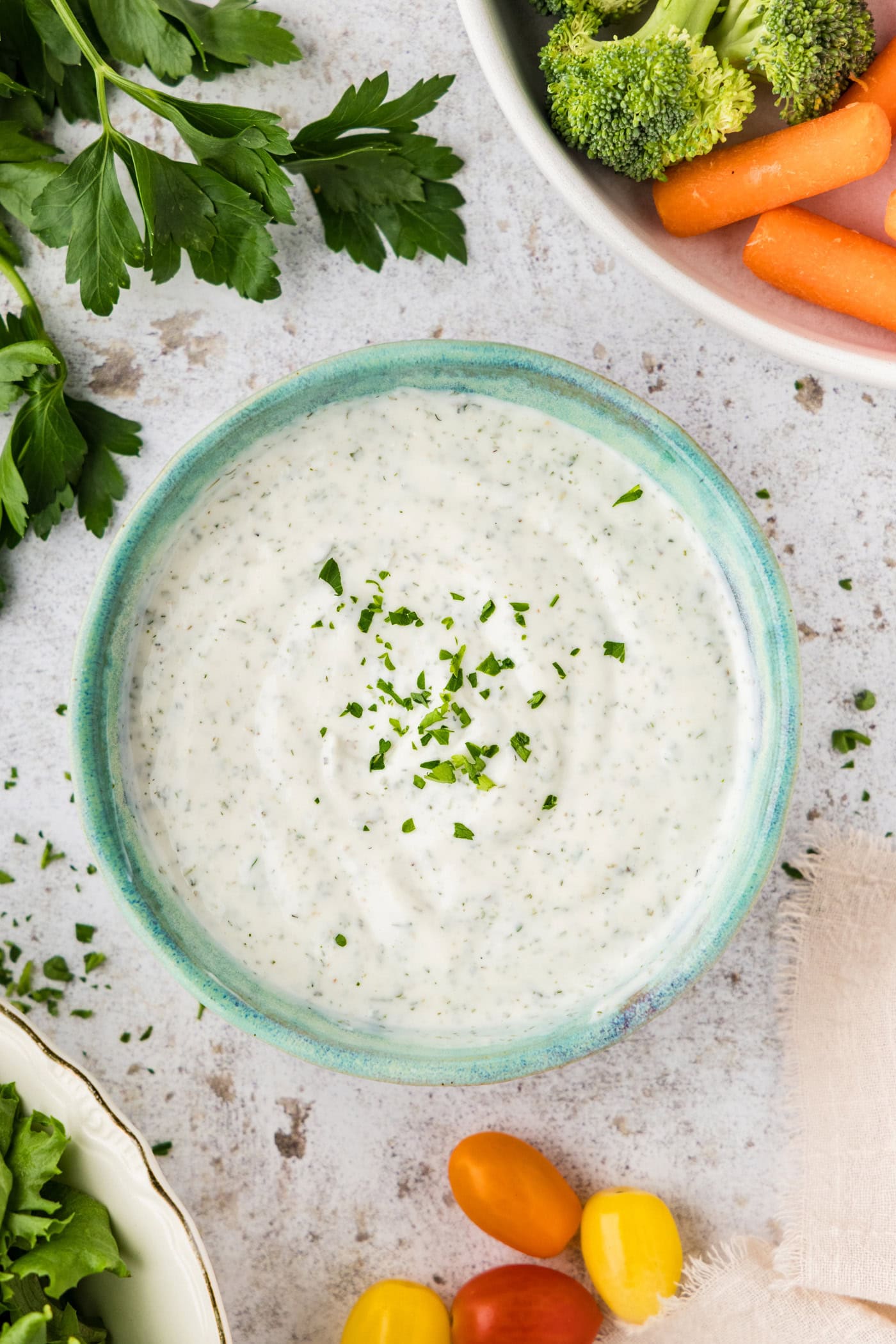 overhead photo of a bowl of Homemade Buttermilk Ranch Dressing