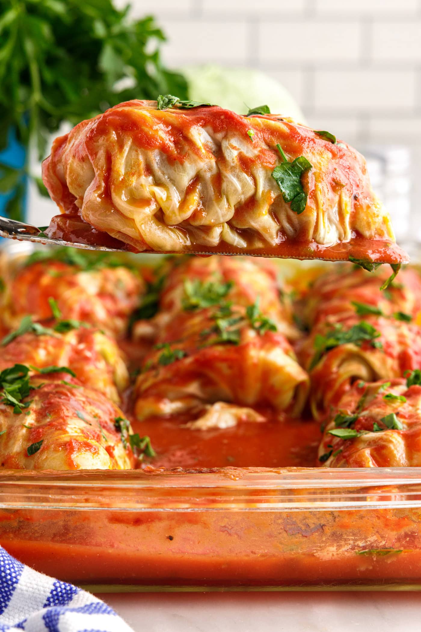 spatula lifting a Cabbage Roll from pan