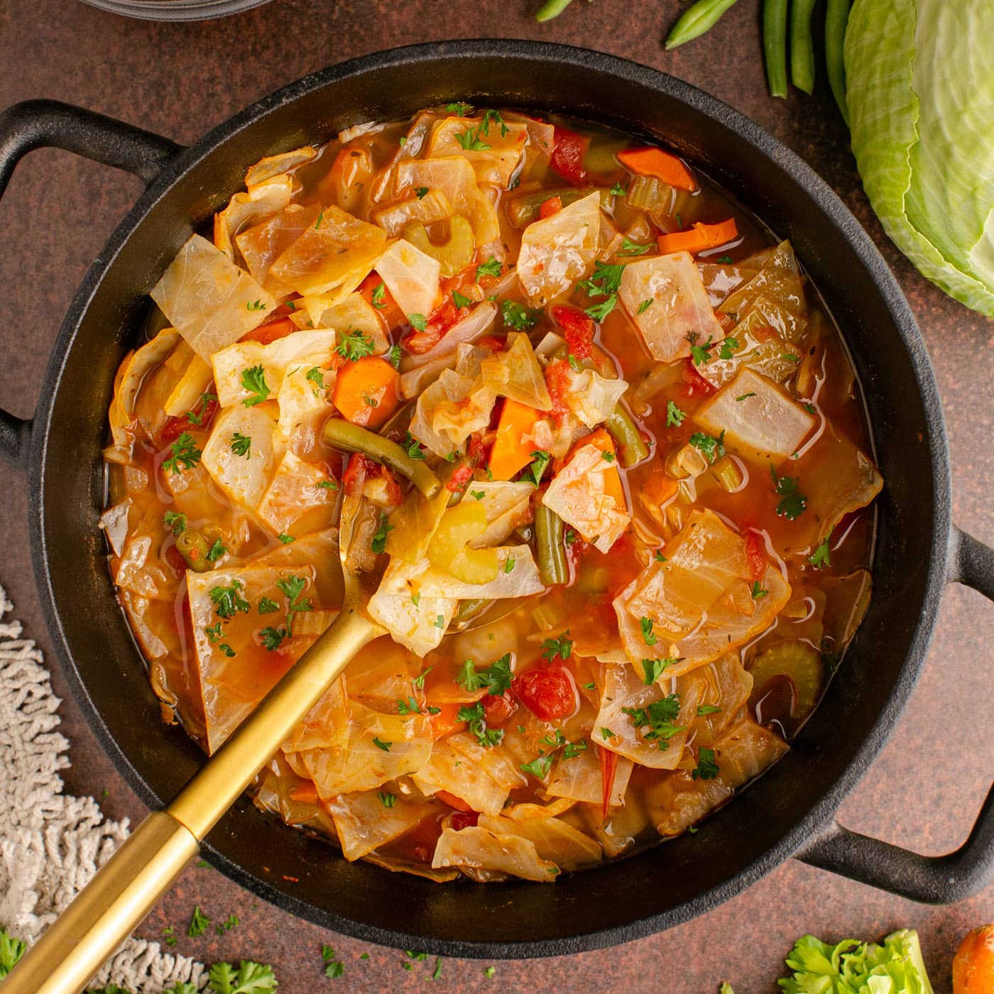 Pot of Cabbage Soup with a serving spoon in it