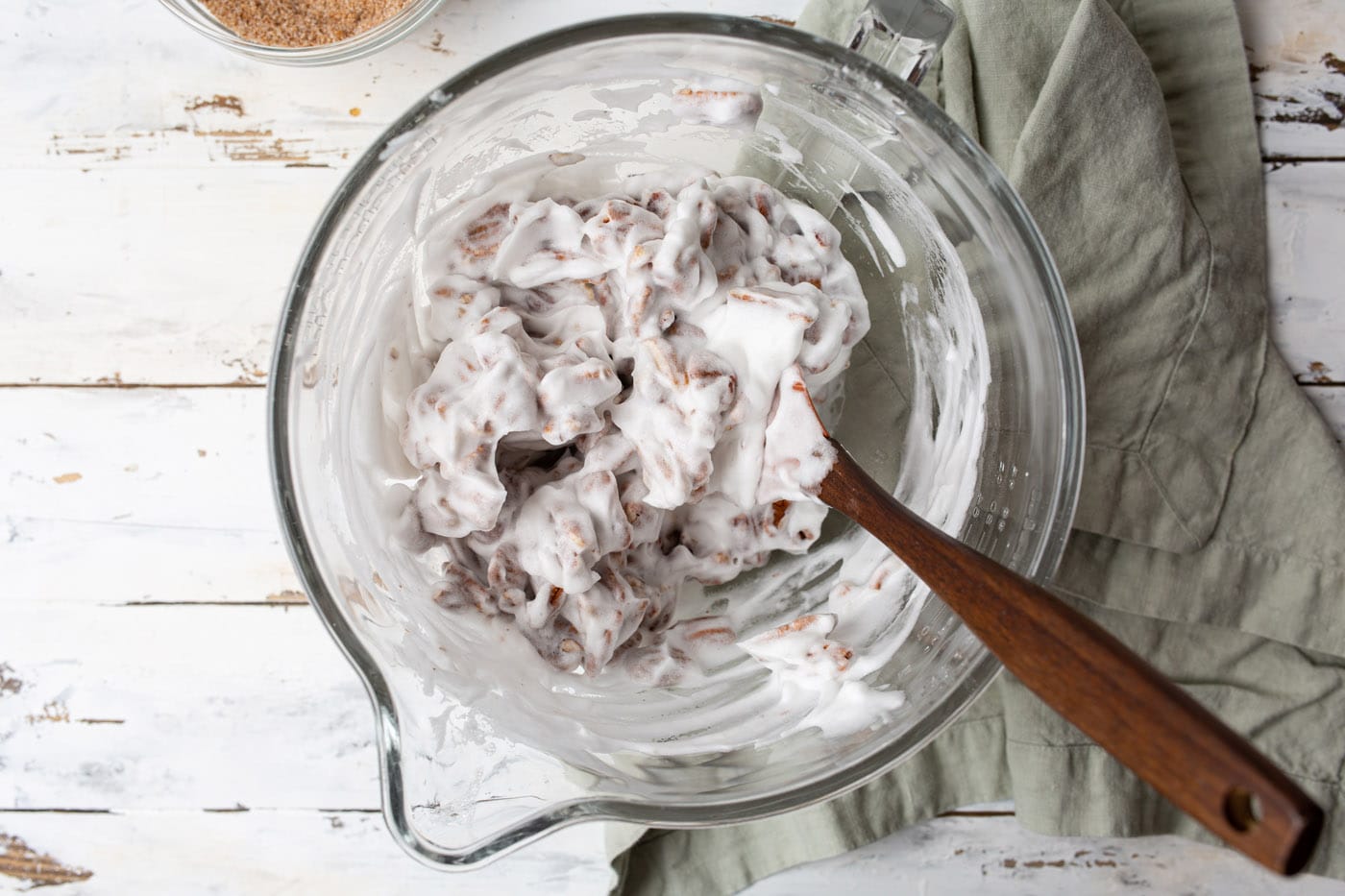 tossing pecans in egg white mixture