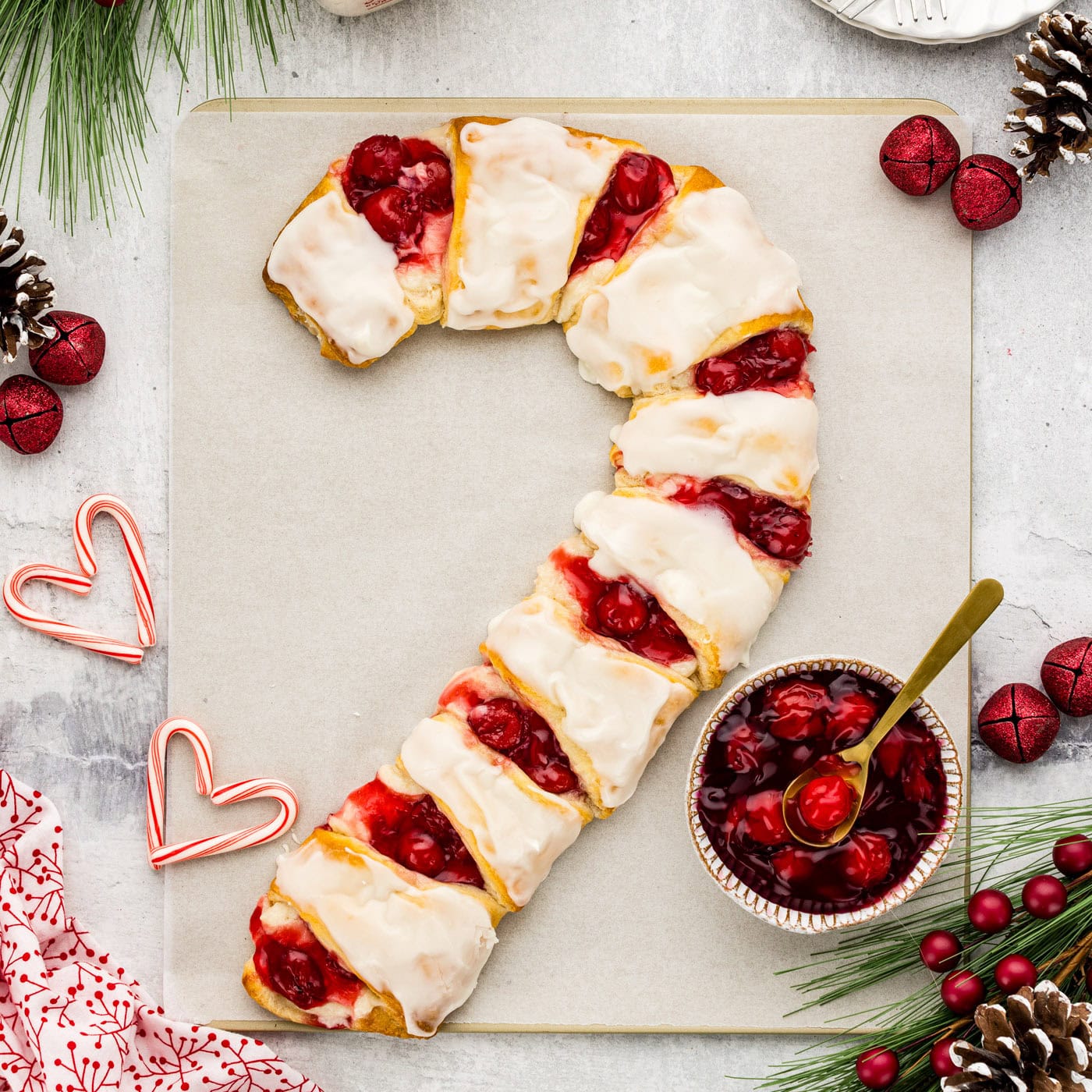Close up photo of a Candy Cane Danish on parchment paper