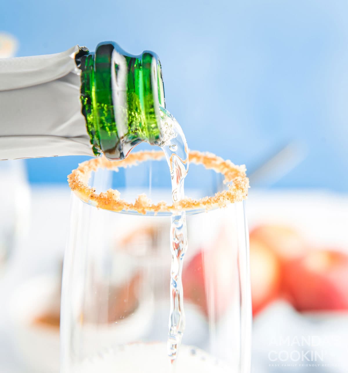 pouring champagne into glass