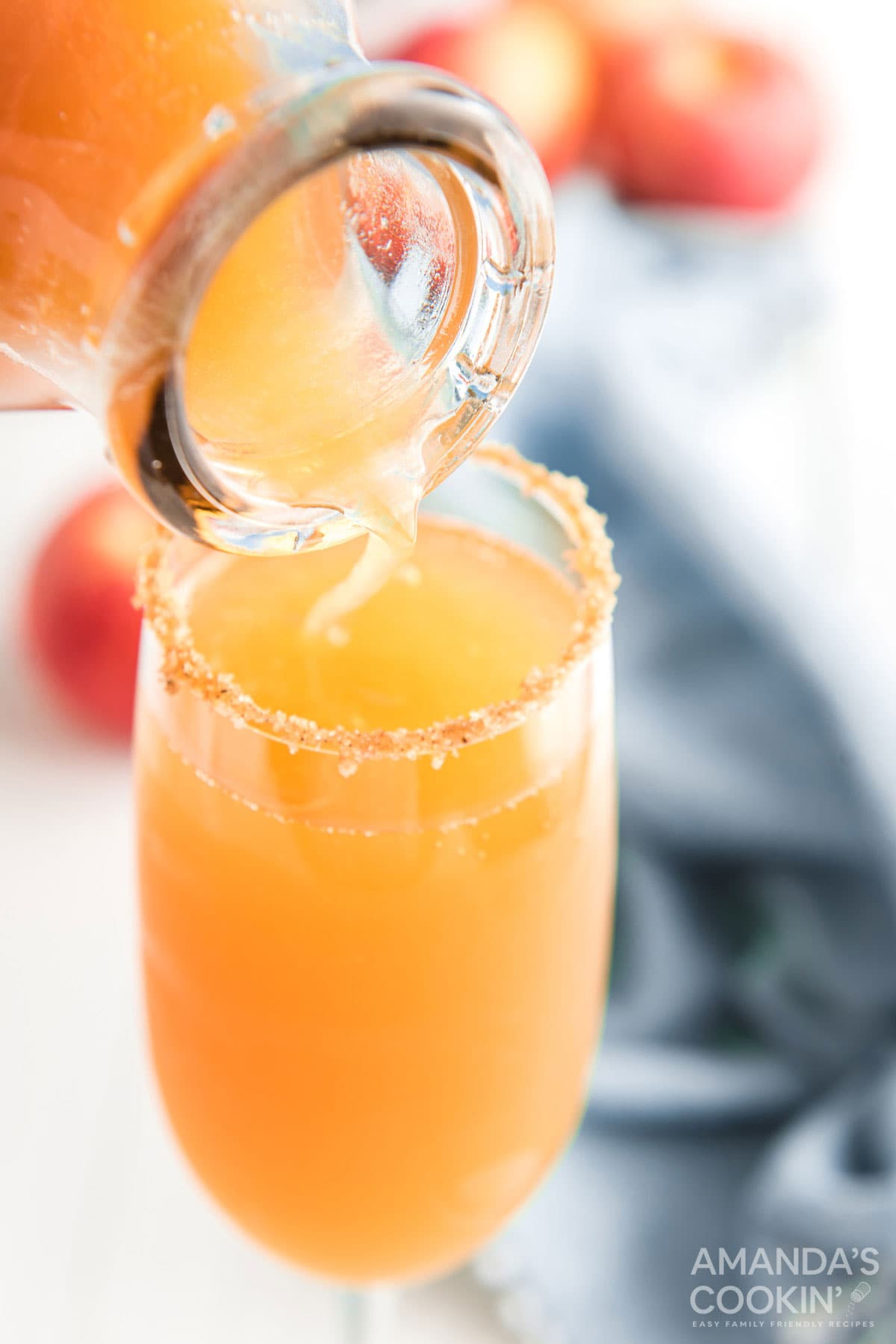 adding apple cider to glass